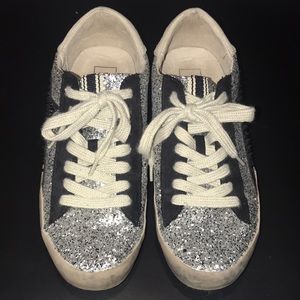 Barely worn Shu Shop shoe size 9 with silver glitter and black Star spikes